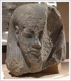 Granodiorite head of a male deity - © MSA